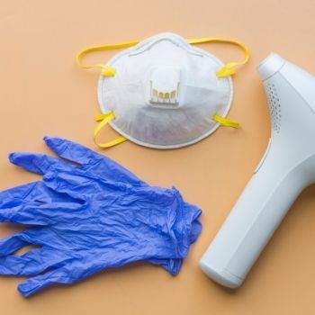 Covid mask gloves and thermometer